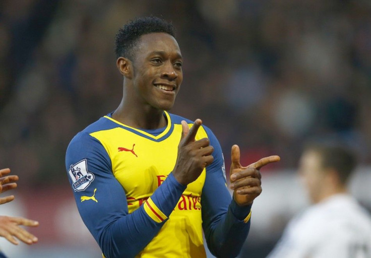 Arsenal's Danny Welbeck celebrates after scoring a goal against West Ham United during their English Premier League soccer match at Upton Park in London December 28, 2014.