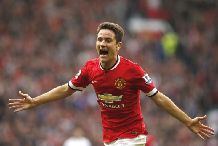 Manchester United's Ander Herrera celebrates scoring a goal against Queens Park Rangers during their English Premier League soccer match at Old Trafford in Manchester, northern England September 14, 2014.