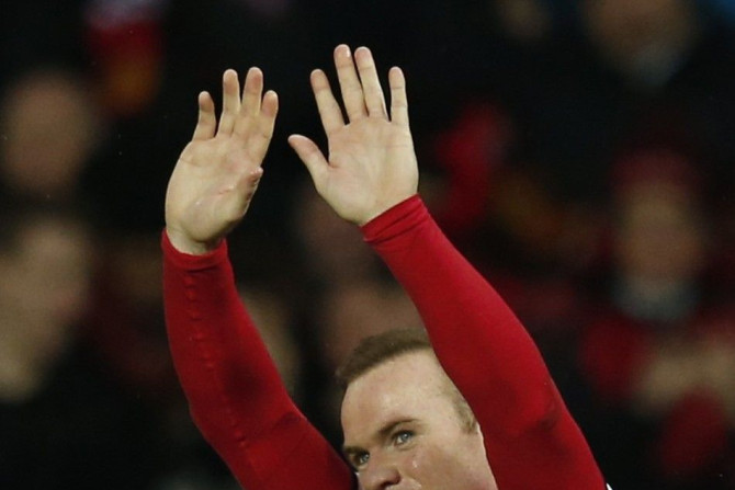 Manchester United&#039;s Wayne Rooney celebrates after scoring his second goal against Newcastle during their English Premier League soccer match at Old Trafford in Manchester, northern England December 26, 2014.