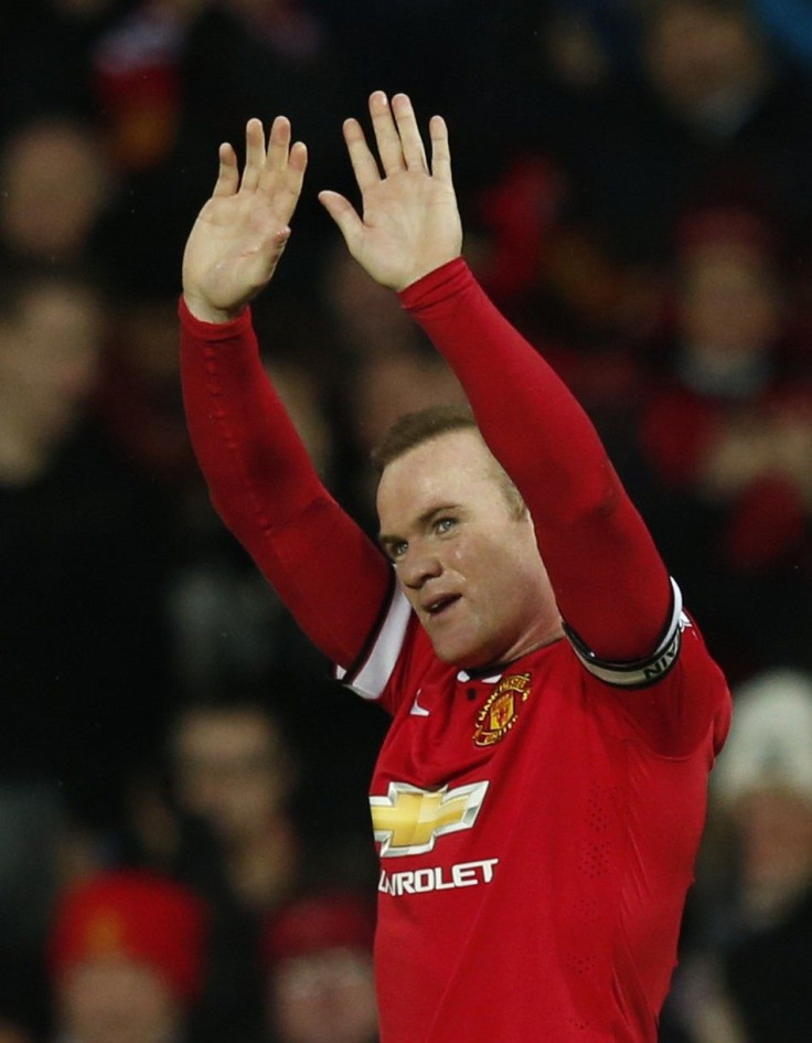 Manchester United&#039;s Wayne Rooney celebrates after scoring his second goal against Newcastle during their English Premier League soccer match at Old Trafford in Manchester, northern England December 26, 2014.