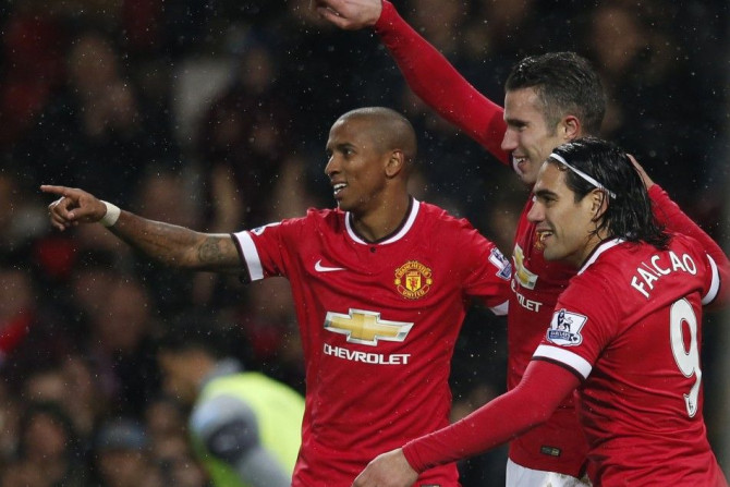 Manchester United&#039;s Robin van Persie (C) celebrates with team-mates Ashley Young (L) and Radamel Falcao after scoring a goal against Newcastle during their English Premier League soccer match at Old Trafford in Manchester, northern England December 2