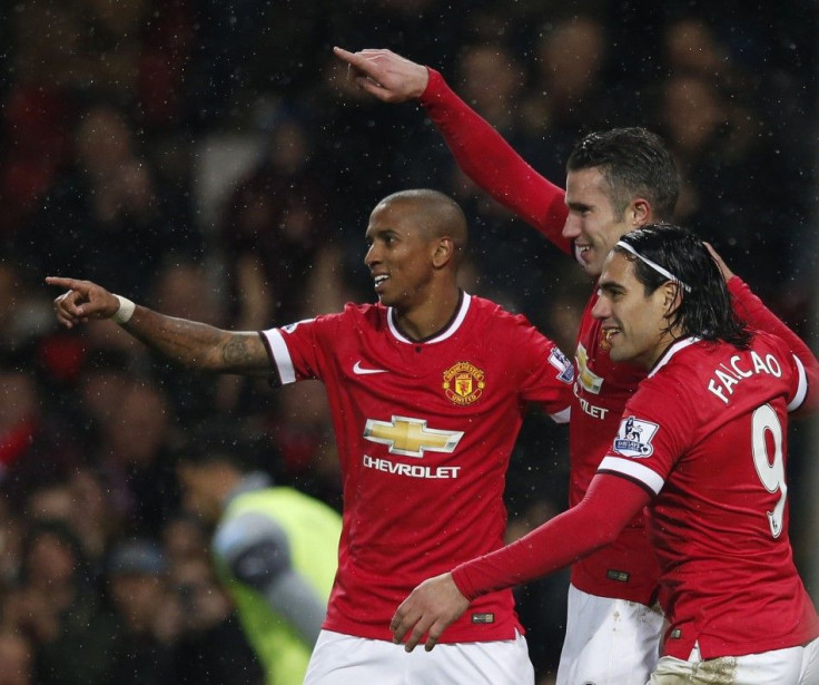 Manchester United&#039;s Robin van Persie (C) celebrates with team-mates Ashley Young (L) and Radamel Falcao after scoring a goal against Newcastle during their English Premier League soccer match at Old Trafford in Manchester, northern England December 2