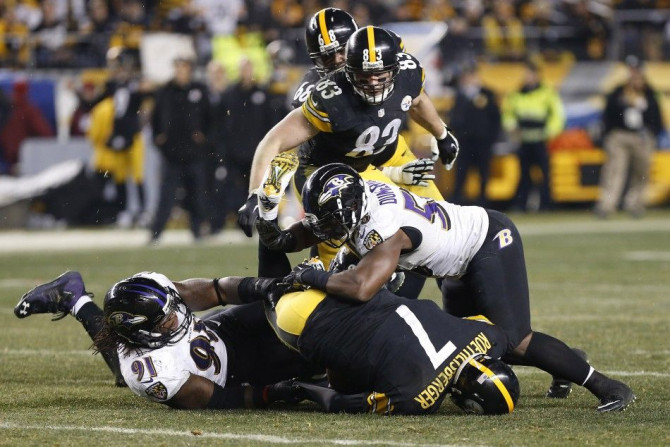 Steelers QB Ben Roethlisberger is sacked by Ravens  OLBs Courtney Upshaw and Elvis Dumervil