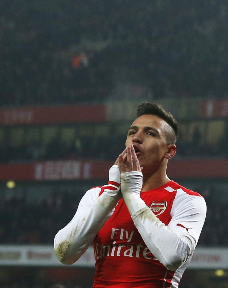 Alexis Sanchez of Arsenal reacts after missing a chance to score against Hull City during their FA Cup third round soccer match at the Emirates Stadium in London, January 4, 2015.