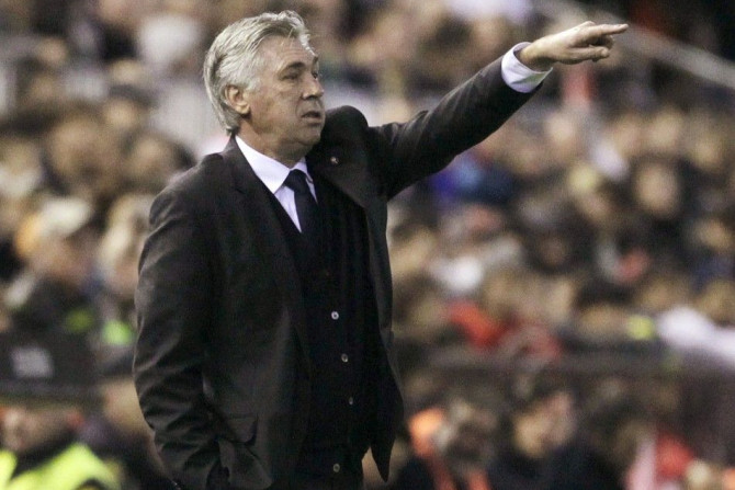 Real Madrid&#039;s coach Carlo Ancelotti gestures during their Spanish first division soccer match against Valencia at the Mestalla stadium in Valencia, January 4, 2015.