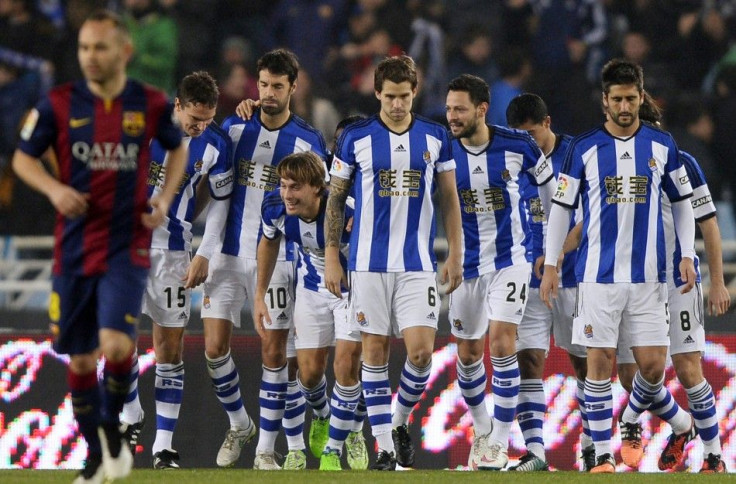 Real Sociedad&#039;s players celebrate scoring against Barcelona during their Spanish first division soccer match at Anoeta stadium in San Sebastian January 4, 2015.