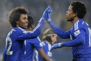 Chelsea&#039;s Loic Remy (R) celebrates with teammate Willian after scoring against Watford during the FA Cup third round soccer match at Stamford Bridge in London January 4, 2015.