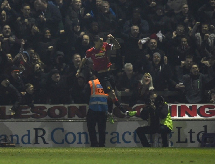 Angel di Maria of Manchester United celebrates scoring their second goal against Yeovil during their FA Cup third round soccer match at Huish Park, Yeovil, western England, January 4, 2015.