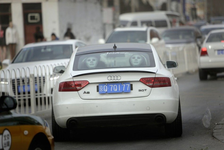 Masks are seen behind the back seats of an Audi A5