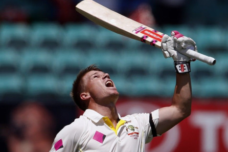 Australia&#039;s David Warner celebrates reaching his century during the first day&#039;s play in the fourth test against India at the Sydney Cricket Ground (SCG) January 6, 2015.