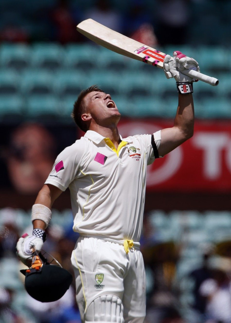 Australia&#039;s David Warner celebrates reaching his century during the first day&#039;s play in the fourth test against India at the Sydney Cricket Ground (SCG) January 6, 2015.