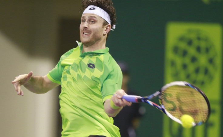 Michael Berrer serves upset against Rafael Nadal in Qatar