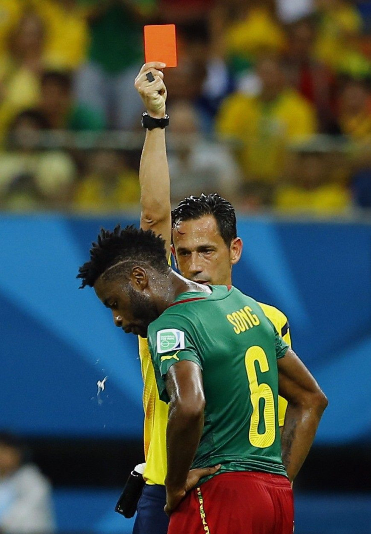 Referee Pedro Proenca of Portugal sends off Cameroon&#039;s Alexandre Song for a challenge on Croatia&#039;s Mario Mandzukic during their 2014 World Cup Group A soccer match at the Amazonia arena in Manaus June 18, 2014.