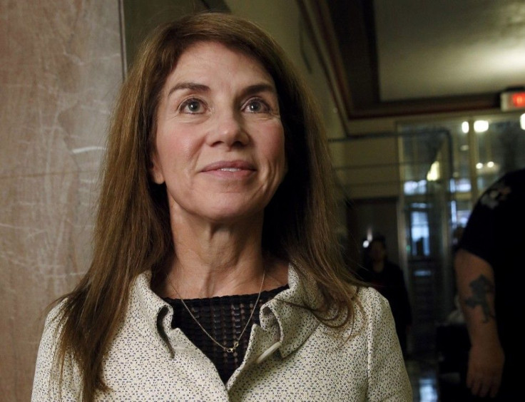 Sue Ann Hamm stands in the courthouse hall before divorce proceedings with Harold Hamm, founder and CEO of Continental Resources, in Oklahoma City, Oklahoma September 22, 2014. Picture taken September 22, 2014.