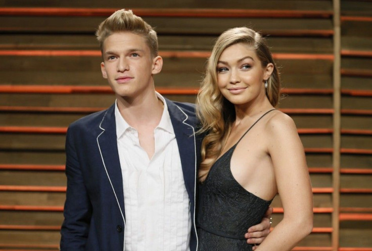 Musician Cody Simpson and his girlfriend Gigi Hadid arrive at the 2014 Vanity Fair Oscars Party