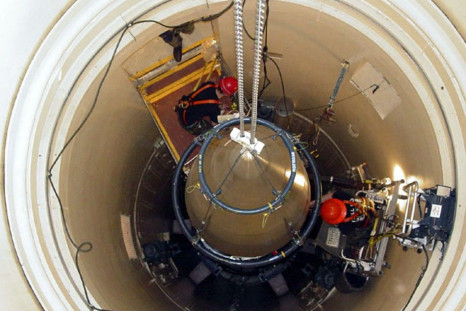 A US Air Force missile maintenance team removes the upper section of an intercontinental ballistic missile with a nuclear warhead in an undated USAF photo at Malmstrom Air Force Base, Montana. Reviews of the U.S. nuclear arsenal show significant changes a