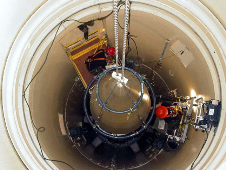 A US Air Force missile maintenance team removes the upper section of an intercontinental ballistic missile with a nuclear warhead in an undated USAF photo at Malmstrom Air Force Base, Montana. Reviews of the U.S. nuclear arsenal show significant changes a