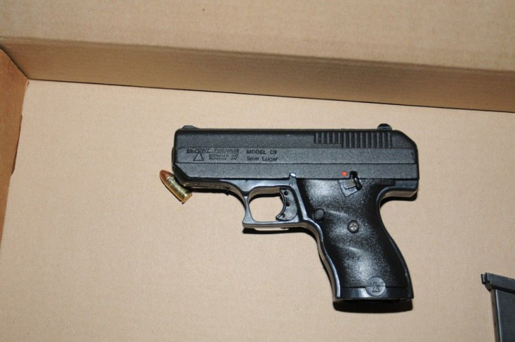 A handgun that was recovered following the officer involved shooting in Berkeley, Missouri, is pictured in this undated handout photo provided by the St. Louis County Police. A white policeman shot dead a black man brandishing a pistol at a suburban St. L