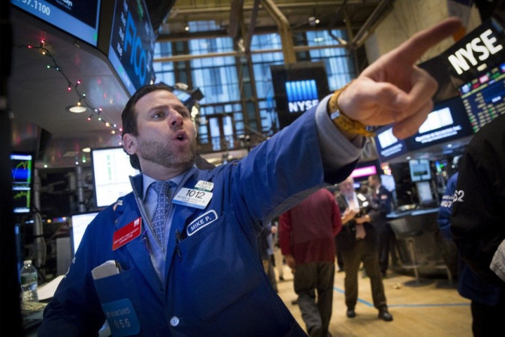 Specialist trader Mike Pistillo works on the floor of the New York Stock Exchange