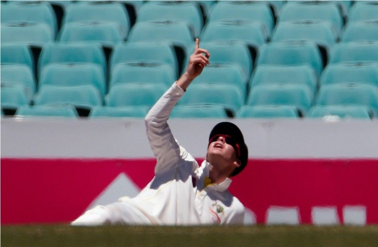 Australia&#039;s captain Steven Smith reacts after dropping a catch from India&#039;s Lokesh Rahul