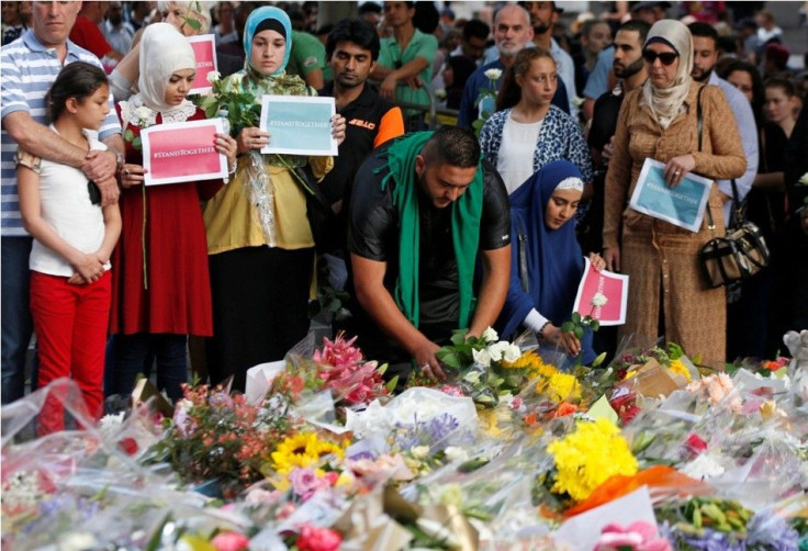 Members of Sydney's Muslim community lay floral tributes to the victims of Sydney's cafe siege in Martin Place