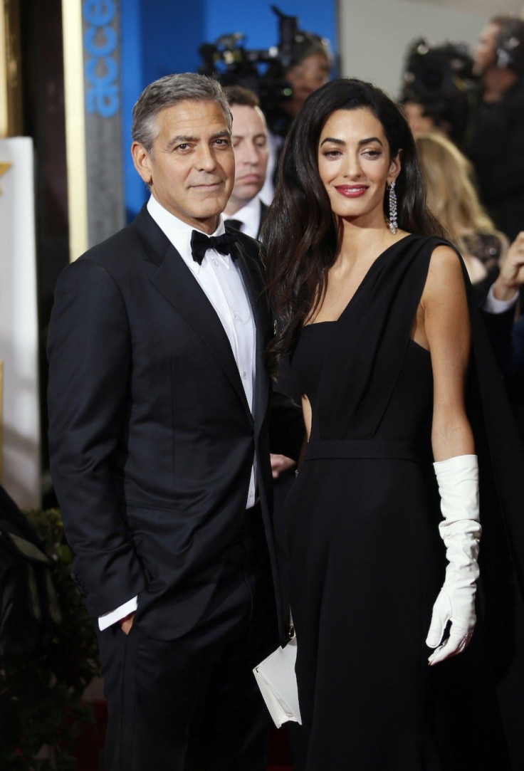 Actor George Clooney and wife, Amal Clooney, arrive at the 72nd Golden Globe Awards in Beverly Hills,