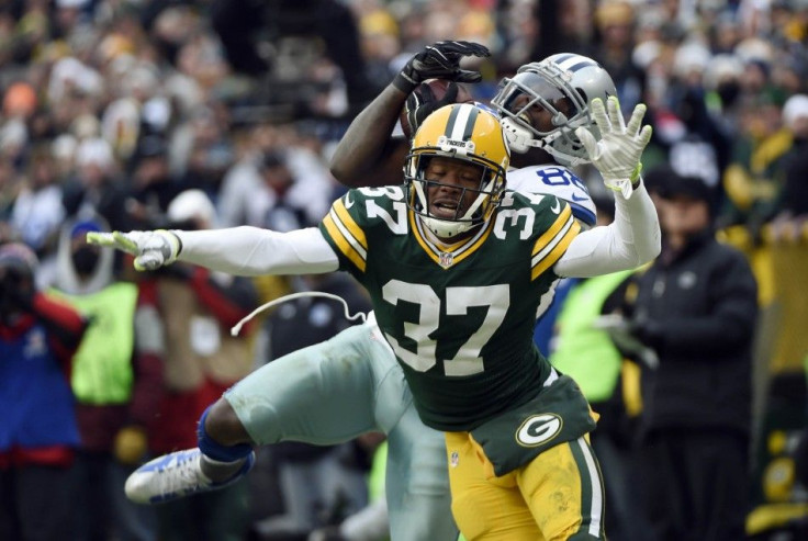 Jan 11, 2015; Green Bay, WI, USA; Dallas Cowboys wide receiver Dez Bryant (88) is unable to catch a pass against Green Bay Packers cornerback Sam Shields (37) in the fourth quarter in the 2014 NFC Divisional playoff football game at Lambeau Field.
