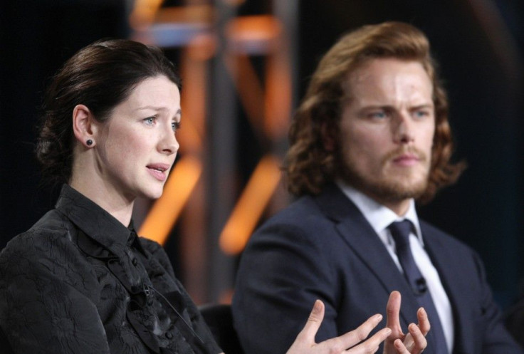 Actors Caitriona Balfe (L) and Sam Heughan participate in the Starz &quot;Outlander&quot; panel