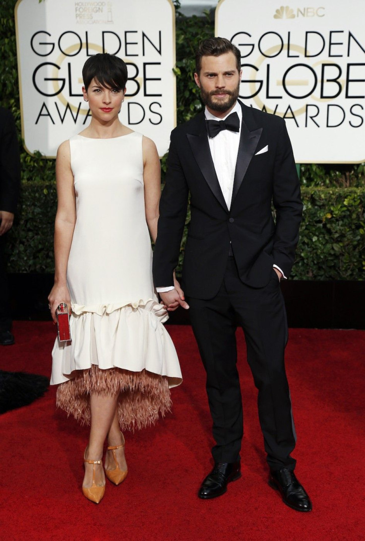Actor Jamie Dornan and Amelia Warner arrive at the 72nd Golden Globe Awards in Beverly Hills