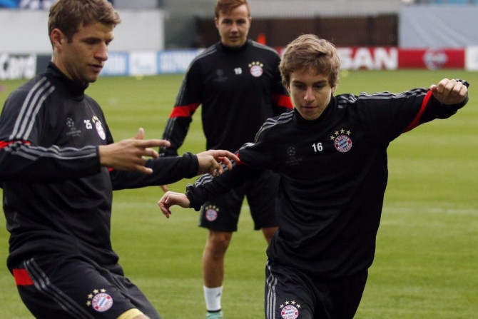 Bayern Munich&#039;s Thomas Muller (L), Mario Gotze (C) and Gianluca Gaudino attend a training session on the eve of their Champions League Group E match against CSKA Moscow at the Arena Khimki outside Moscow, September 29, 2014.