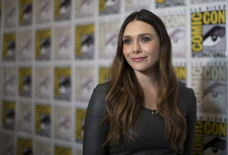 Cast member Elizabeth Olsen poses at a press line for the movie &quot;Avengers: Age of Ultron&quot;