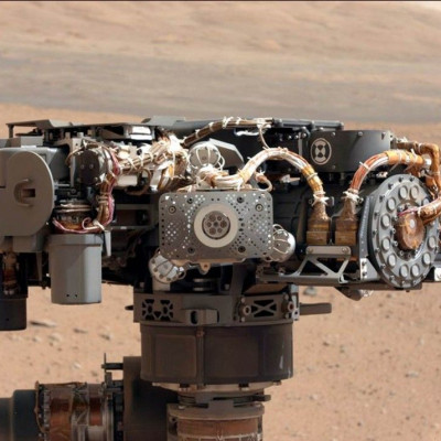 In this image taken by Curiosity&#039;s Mast Camera, the Alpha Particle X-Ray Spectrometer (APXS) on NASA&#039;s Curiosity rover is pictured, with the Martian landscape in the background on the 32nd Martian day, or sol, of operations on the surface on Sep