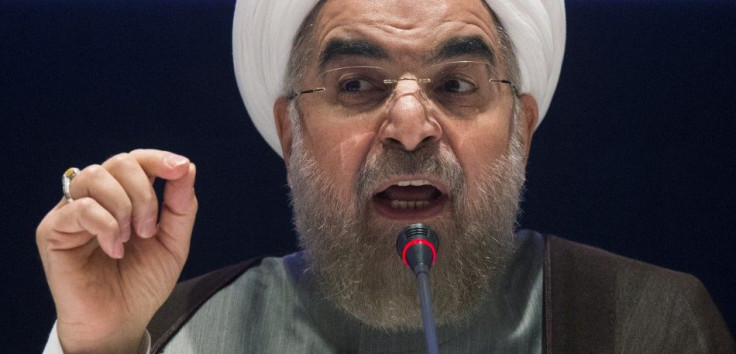 Iran's President Hassan Rouhani replies to a question during a news conference