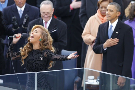 Beyonce sings the U.S. National Anthem as President Barack Obama (R) and Senator Charles Schumer (D-NY) listen during swearing-in ceremonies on the West front of the U.S. Capitol in Washington, January 21, 2013.
