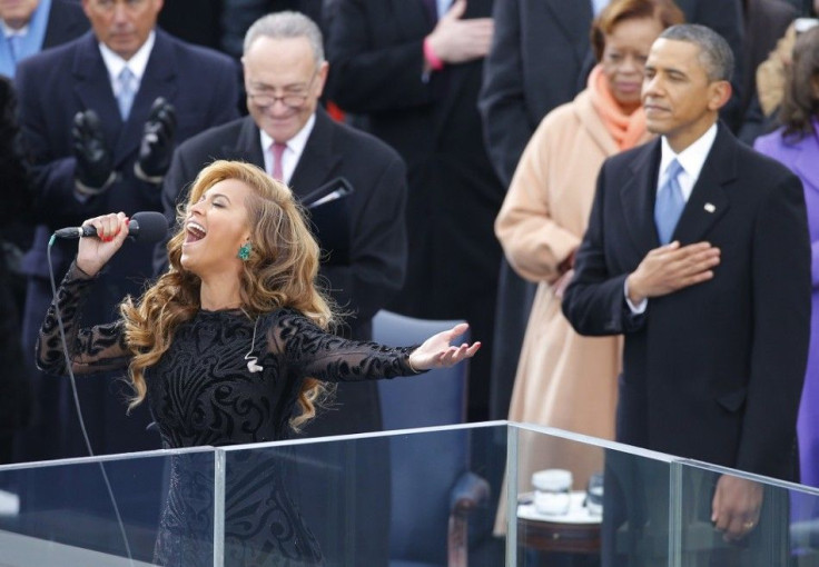 Beyonce sings the U.S. National Anthem as President Barack Obama (R) and Senator Charles Schumer (D-NY) listen during swearing-in ceremonies on the West front of the U.S. Capitol in Washington, January 21, 2013.
