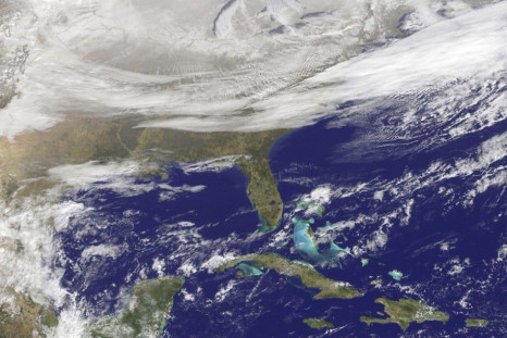 A blanket of northern snow and lake-effect snow from the Great Lakes and clouds behind an Arctic cold front are seen in an image from NOAA's GOES-East satellite taken January 7, 2015. An Arctic air blast from Canada hit the U.S. Midwest, Mid-Atlantic