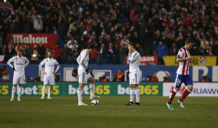 Real Madrid&#039;s Cristiano Ronaldo (2nd R) and Gareth Bale (3rd L) react after Atletico Madrid&#039;s first goal by Raul Garcia during their Spanish King&#039;s Cup soccer match at Vicente Calderon stadium in Madrid, January 7, 2015.