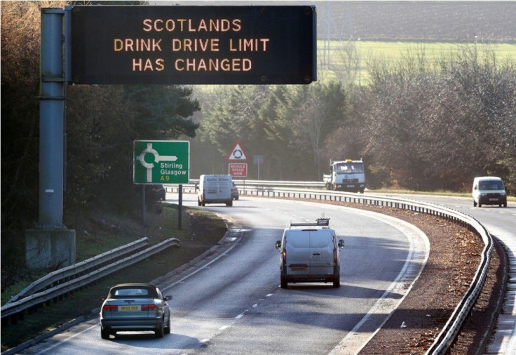 Drivers are informed by a sign that the drink-drive limit has changed in Scotland