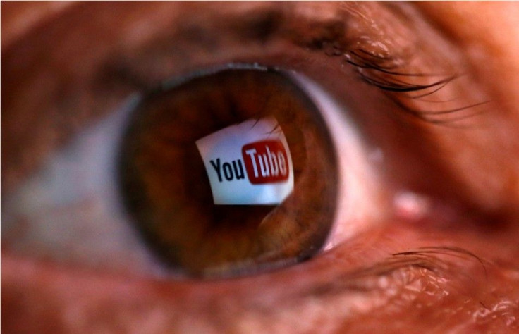 A picture illustration shows a YouTube logo reflected in a person's eye