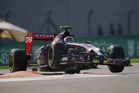 Toro Rosso Formula One driver Jean-Eric Vergne of France drives during the third free practise session of Abu Dhabi F1 Grand Prix at the Yas Marina circuit in Abu Dhabi November 22, 2014. REUTERS/Hamad I Mohammed