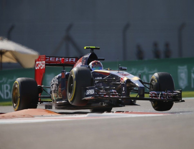 Toro Rosso Formula One driver Jean-Eric Vergne of France drives during the third free practise session of Abu Dhabi F1 Grand Prix at the Yas Marina circuit in Abu Dhabi November 22, 2014. REUTERS/Hamad I Mohammed