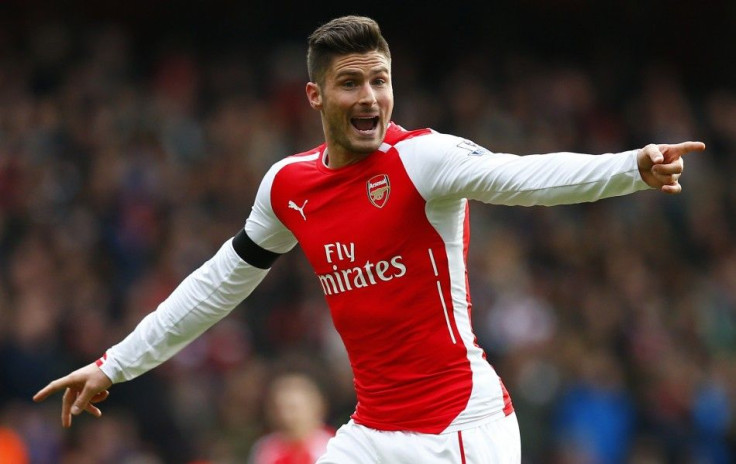 Arsenal&#039;s Olivier Giroud wears a black armband in tribute to the victims of this week&#039;s Islamist militant attacks in France, during their English Premier League soccer match against Stoke City at the Emirates Stadium in London January 11, 2015.