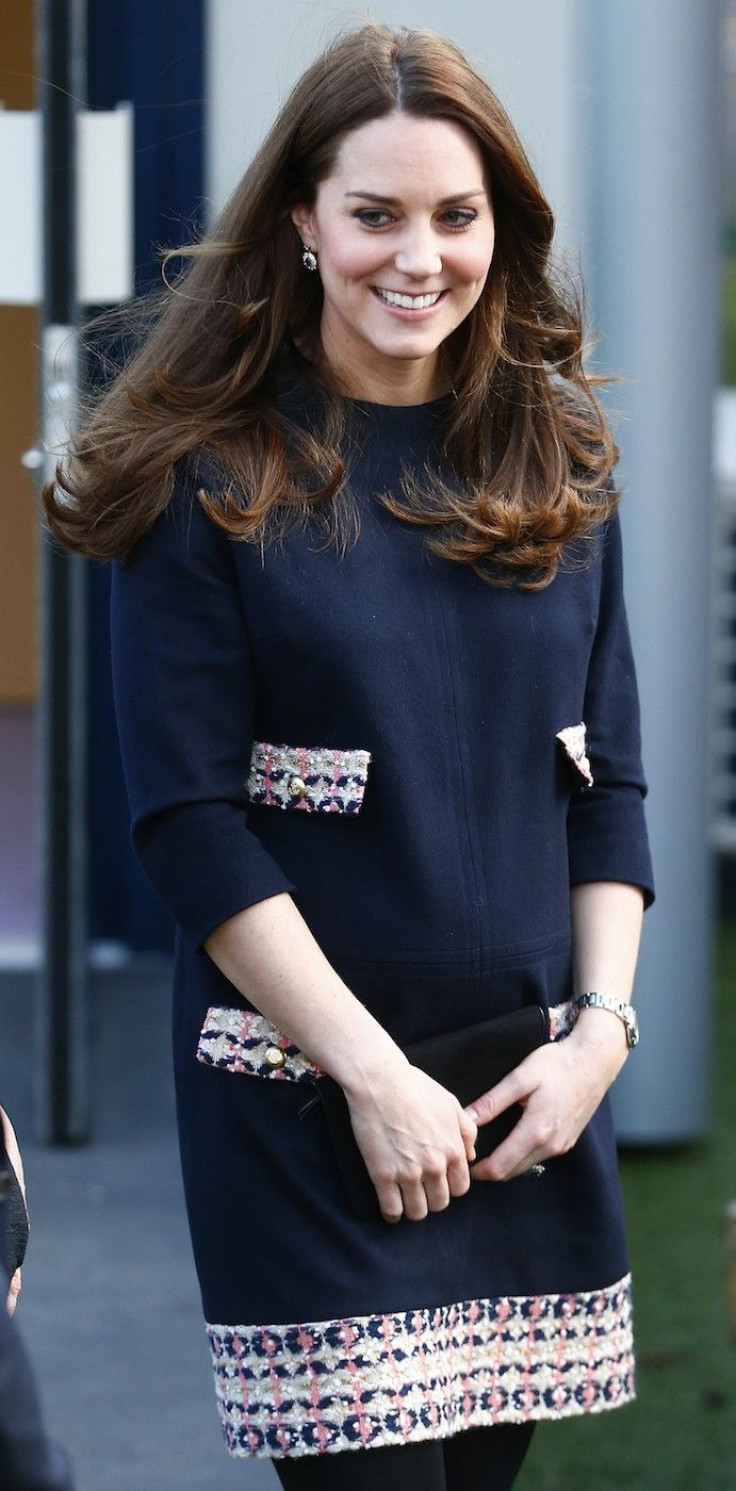 Britain&#039;s Catherine, Duchess of Cambridge smiles as she leaves after visiting the Clore Art Room