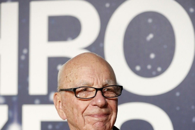 Executive Chairman of News Corp and Chairman and CEO of 21st Century Fox Rupert Murdoch arrives on the red carpet during the second annual Breakthrough Prize Awards at the NASA Ames Research Center in Mountain View, California November 9, 2014.