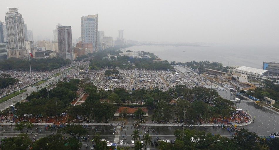 An overview of an open-air Mass led by Pope Francis at Rizal Park in Manila January 18, 2015. Pope Francis said a huge open-air Mass for a rain-drenched crowd of millions in the Philippine capital on Sunday, after appealing to the world to quotlearn how