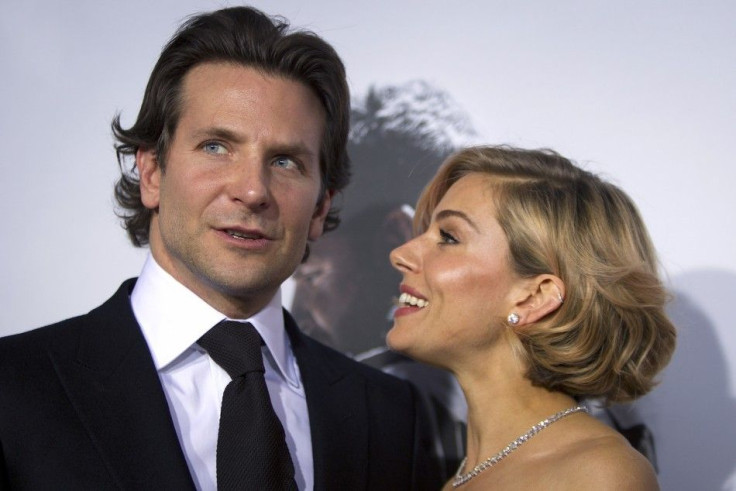 Actress Sienna Miller (R) and actor Bradley Cooper arrive for the premiere of the film &quot;American Sniper&quot;