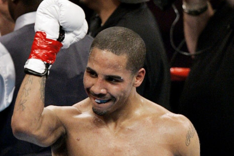 U.S. Olympic gold medalist Andre Ward, making his professional boxing debut, celebrates after defeating super-middleweight opponent Christopher Molina during the second round of their bout in Los Angeles December 18, 2004.