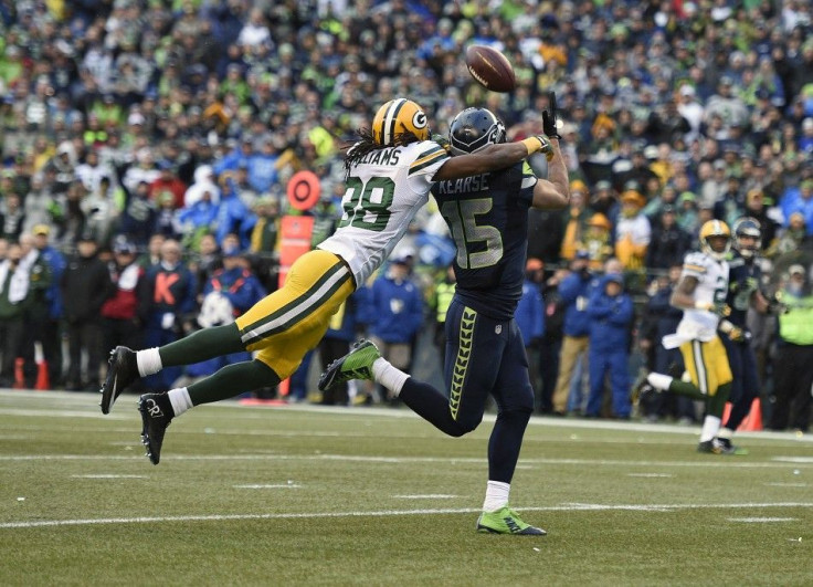 January 18, 2015; Seattle, WA, USA; Seattle Seahawks wide receiver Jermaine Kearse (15) catches a 35 yard pass from quarterback Russell Wilson (not pictured) for the game winning touchdown ahead of Green Bay Packers cornerback Tramon Williams (38) during 