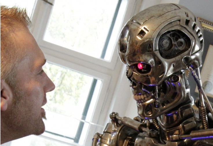 A visitor looks at a robot figure from the movie 'the Terminator'