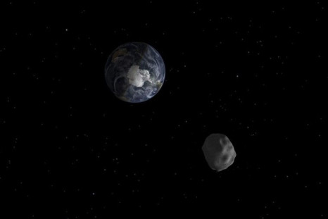 The passage of asteroid 2012 DA14 through the Earth-moon system, is depicted in this handout image from NASA. On February 15, 2013, an asteroid, 150 feet (45 meters) in diameter will pass close, but safely, by Earth. The flyby creates a unique opportunity